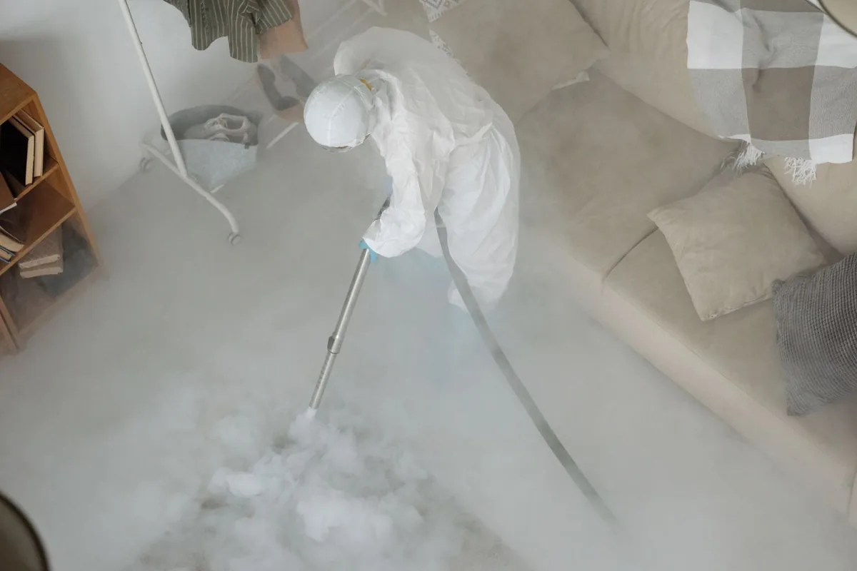 Biohazard cleanup technician in protective equipment, New London, WI